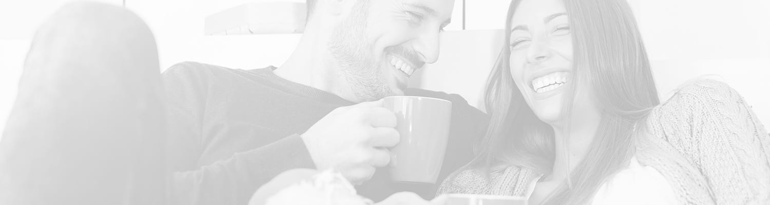 man and woman laughing