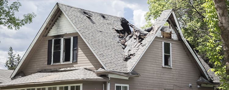 roof damaged with shingles missing